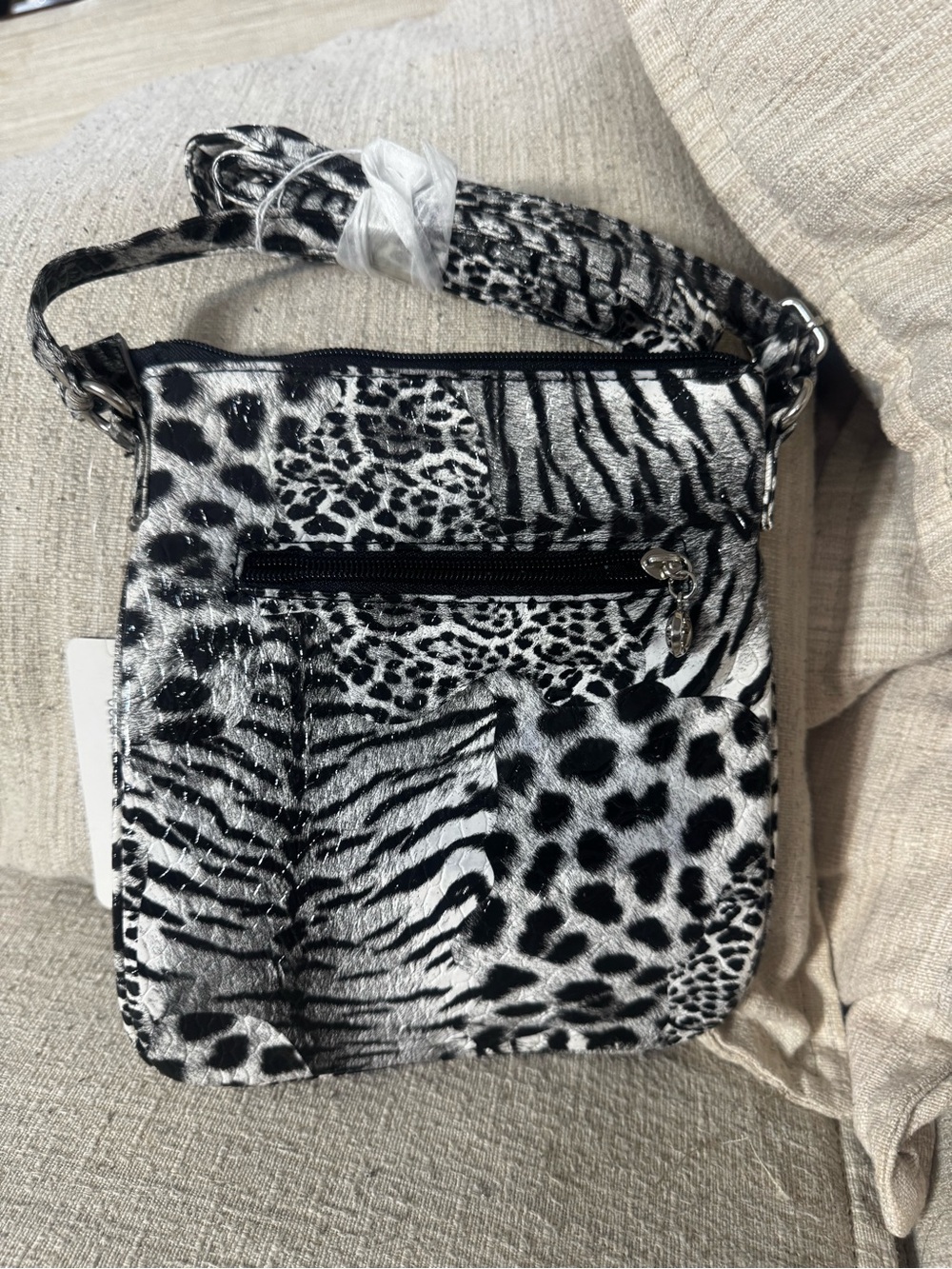 Black & White Animal Print Crossbody Bag with Front Zip Pocket
